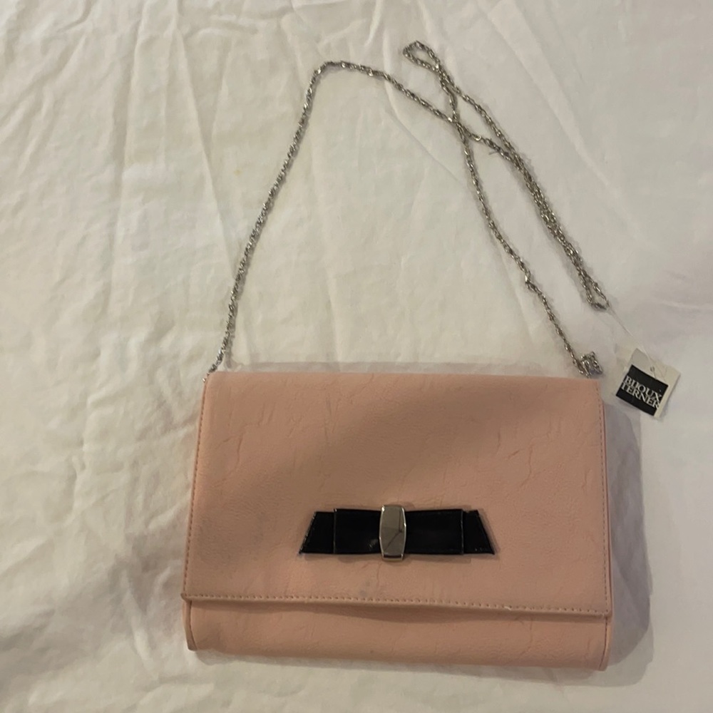 Pink leather clutch black bow detail